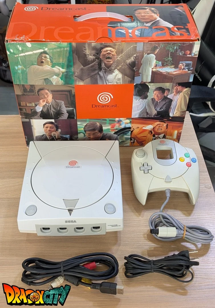 Dreamcast VA0 60Hz + Boîte + Bios Freezone + Patch 50Hz/60Hz Auto + Alimentation 220V + 1 Manette + Câble Vidéo + Câble Alimentation + Serial Matching + Condensateurs GDROM changés (neuf)