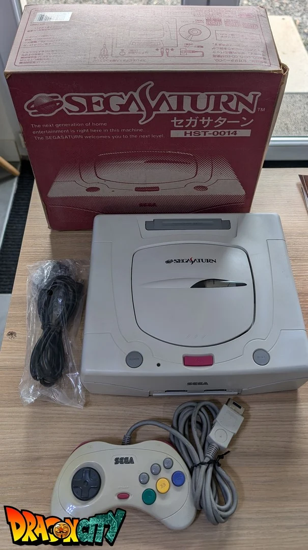 Saturn JAP Blanche 60Hz + Boîte + Bios Freezone + Alimentation SAT-Psu + Mémoire FRAM + Câble RGB + Serial Matching