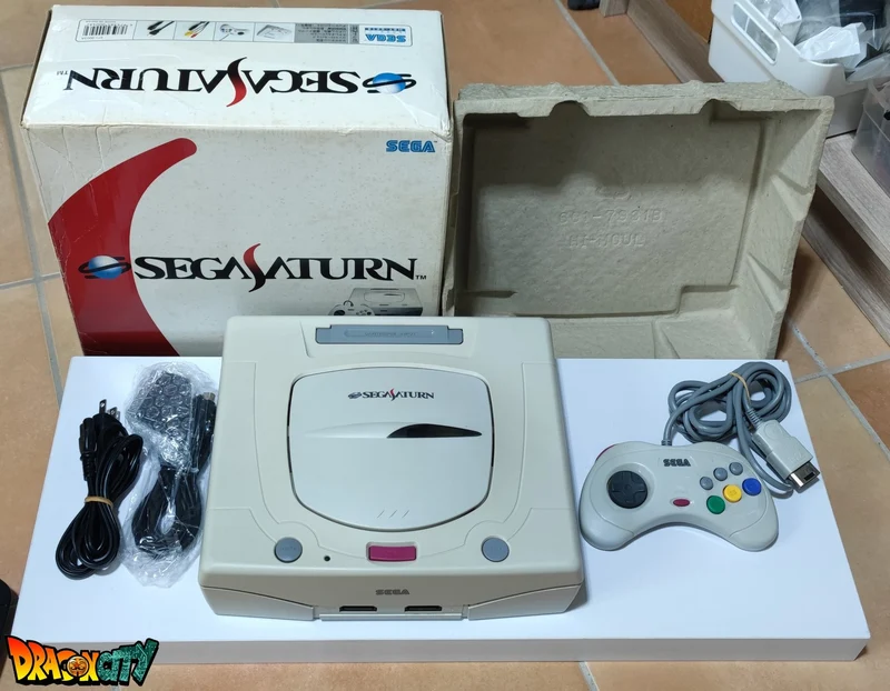 Saturn JAP Blanche 60Hz + Boîte + Bios Freezone + Alimentation SAT-Psu + Mémoire FRAM + Câble RGB