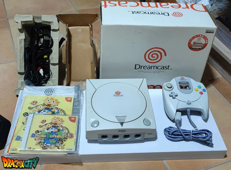 Dreamcast VA0 60Hz + Bios Freezone + Patch 50Hz/60Hz Auto + Boîte + Alimentation 220V + 1 Manette + Notices + Dream Passport 3 + Câble Vidéo + Câble Alimentation