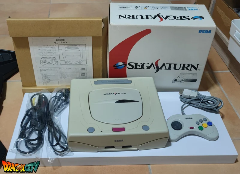 Saturn JAP Blanche 60Hz + Boîte + Bios Freezone + Alimentation SAT-Psu + Mémoire FRAM + Switchless 50/60Hz + Serial Matching