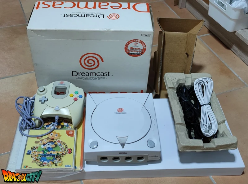 Dreamcast VA1 Freezone 60Hz + Patch 50Hz/60Hz Auto + Boîte + Alimentation 220V + 1 Manette + Notices + Dream Passport 3 "NEUF" + Câble Vidéo + Câble Alimentation + Serial Matching + Câble RJ11