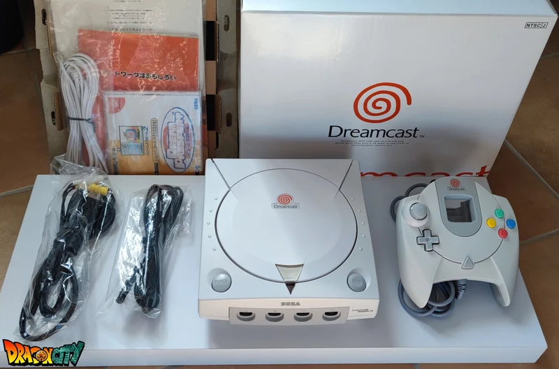 Dreamcast VA1 Freezone 60Hz + Boîte + Alimentation 220V + 1 Manette + Notices + Dream Passport 2 "NEUF" + Câble Vidéo + Câble Alimentation +Câble RJ11 + Serial Matching